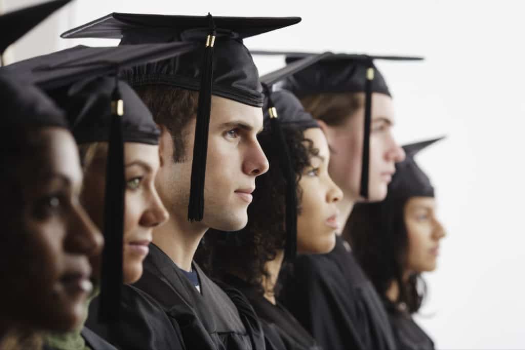 Graduates in Cap and Gown --- Image by © Royalty-Free/Corbis